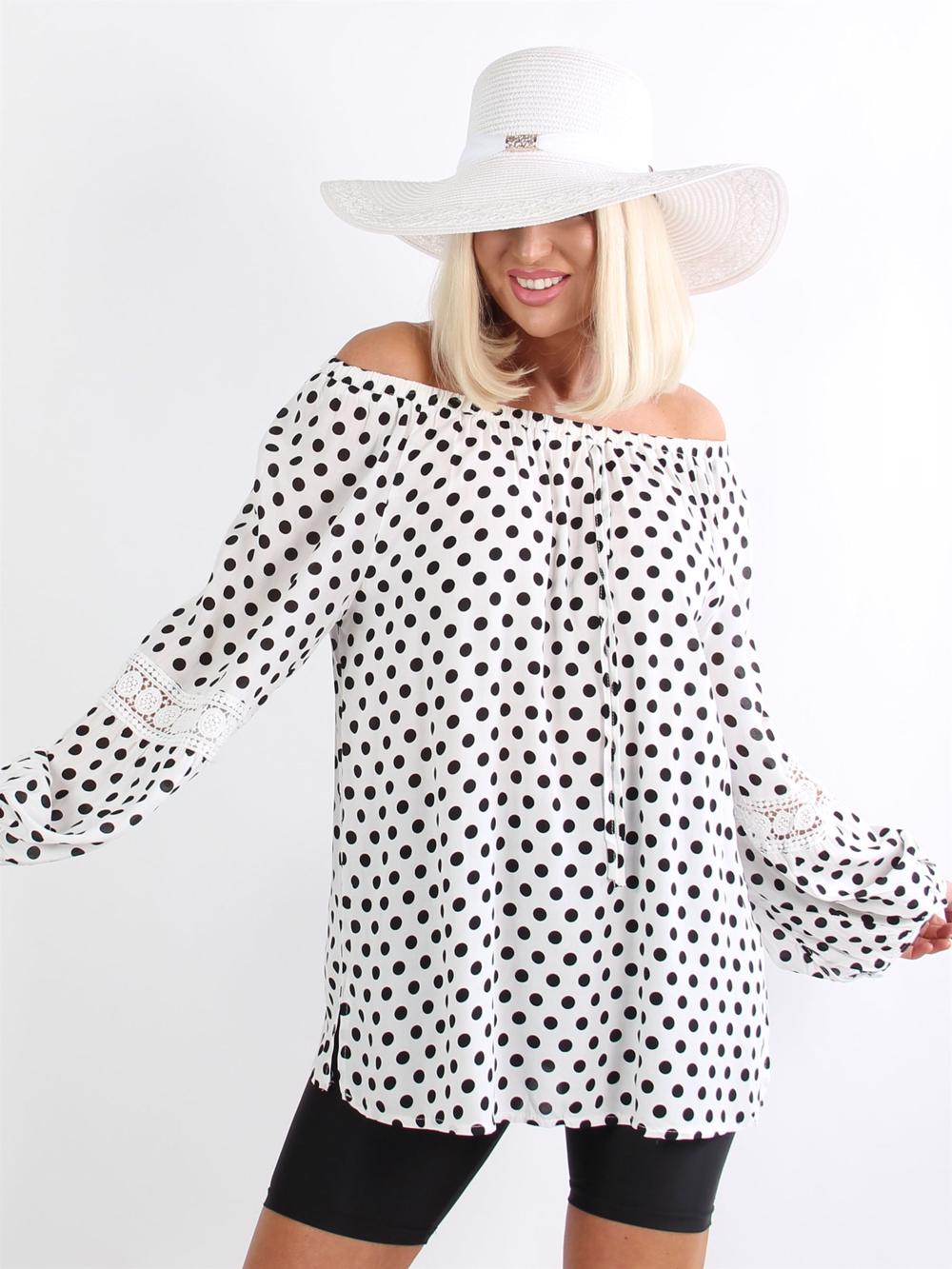 Lindsay - Svart tunika med vita prickar och broderade detaljer på ärmarna